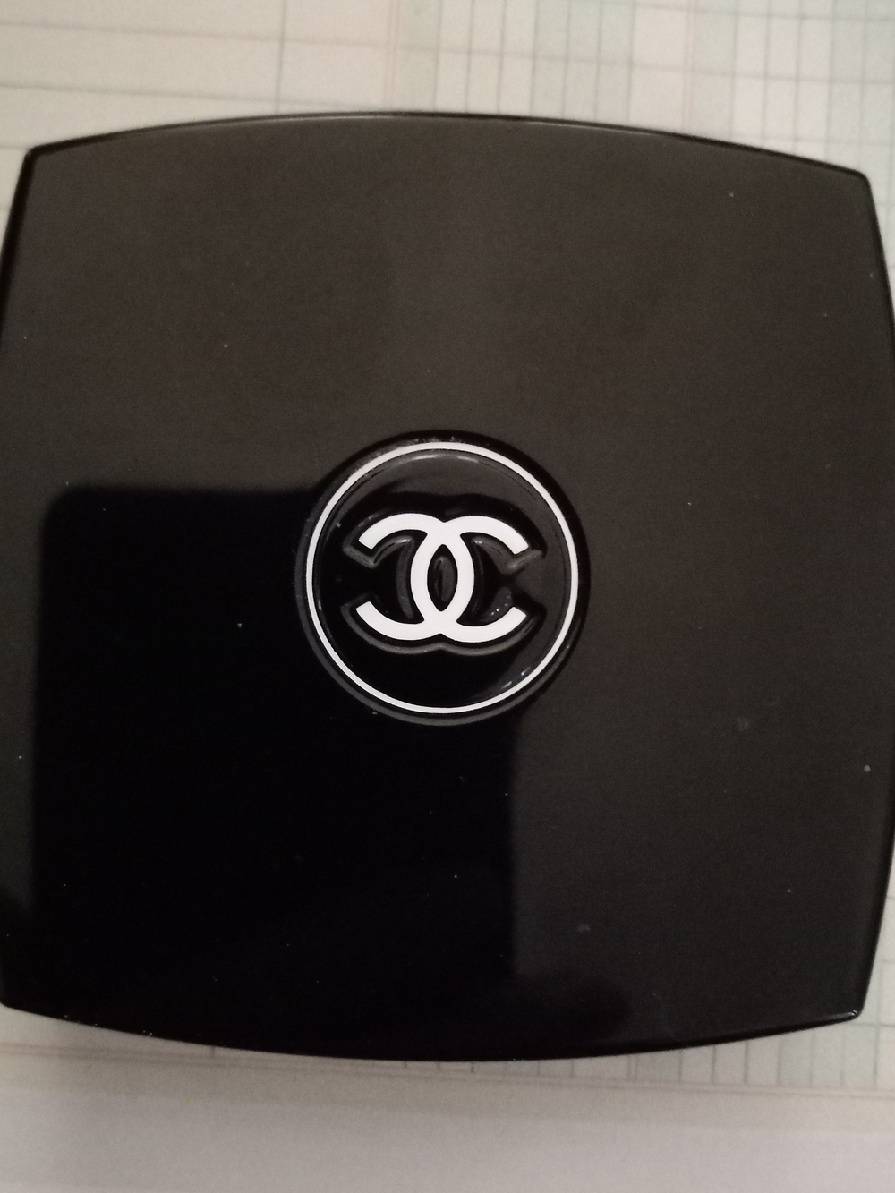 CHANEL Black Compact with White Interlocking CC Emblem
